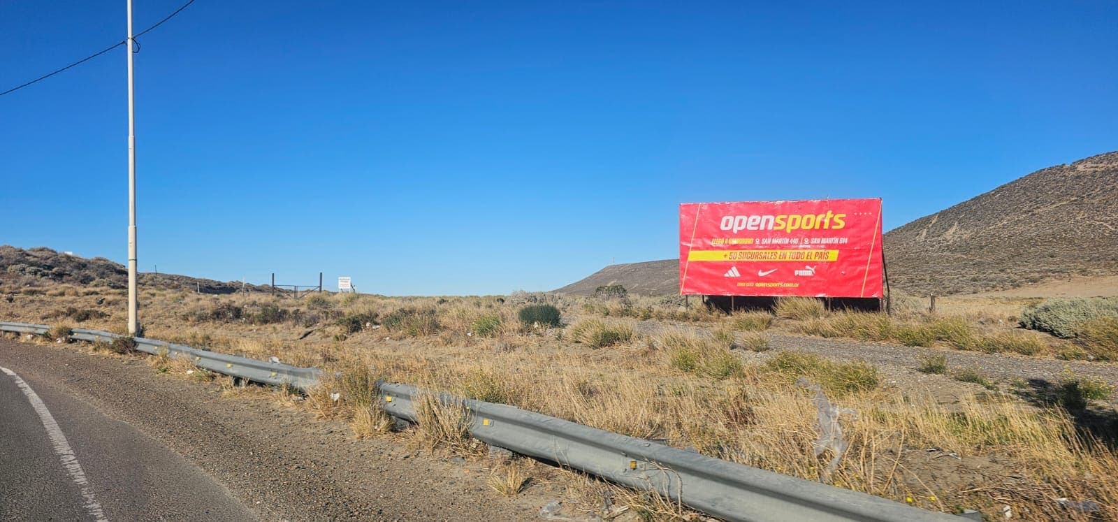 Cartel rutero — Rotonda Ruta 3 y 26, Comodoro Rivadavia